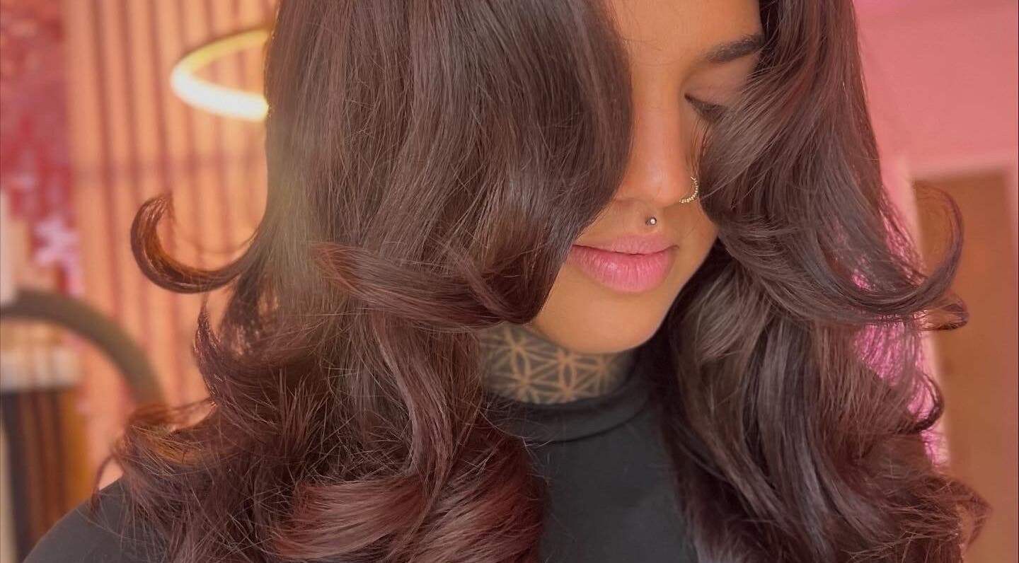 Elegant brown curls at Hair by Susie Hancock, Ferndown, England, GB.