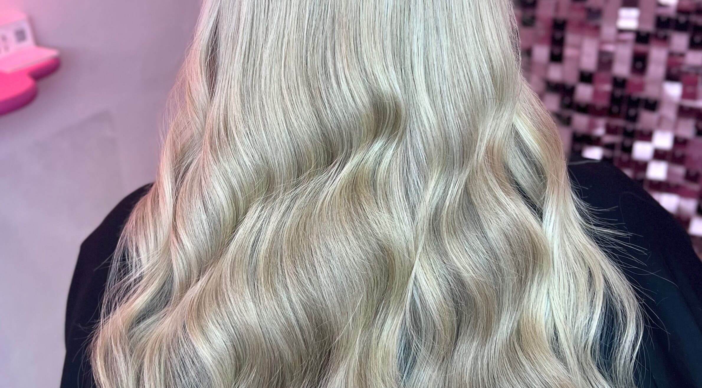 Blonde waves styled at Hair by Susie Hancock in Ferndown, England, GB, showcasing expert hair artistry.