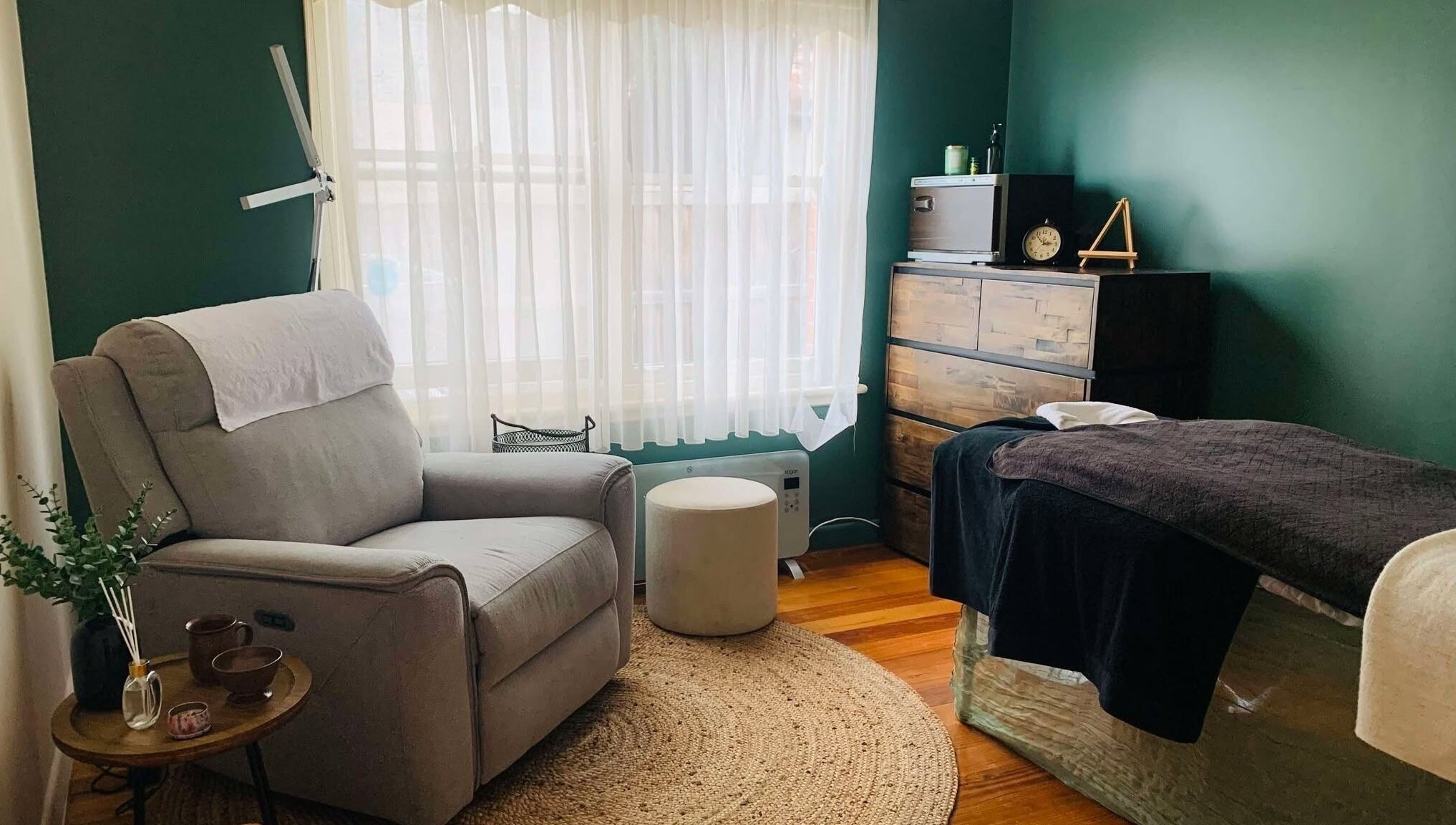 Serene massage room at Remedy Massage Studio by June, Bentleigh East, Victoria, AU, featuring a relaxing chair.