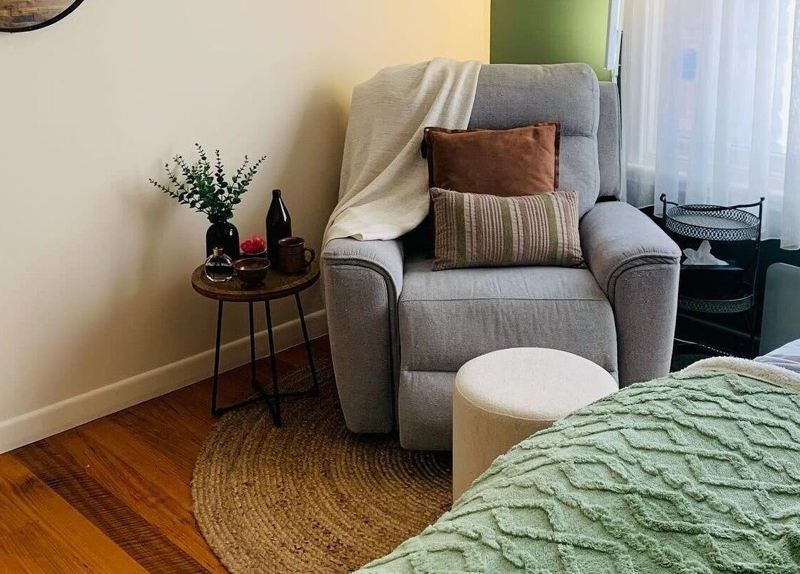 Inviting lounge chair in Remedy Massage Studio by June, Bentleigh East, Victoria, AU with relaxing decor.