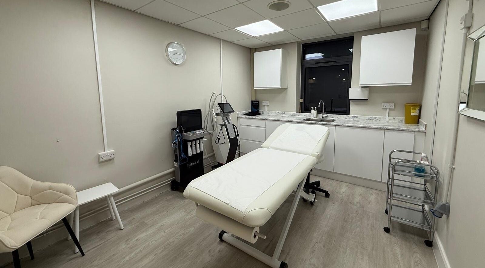 Modern treatment room at Aura Beauty and Aesthetics Whiteley, Whiteley, England, GB with clean, serene design.