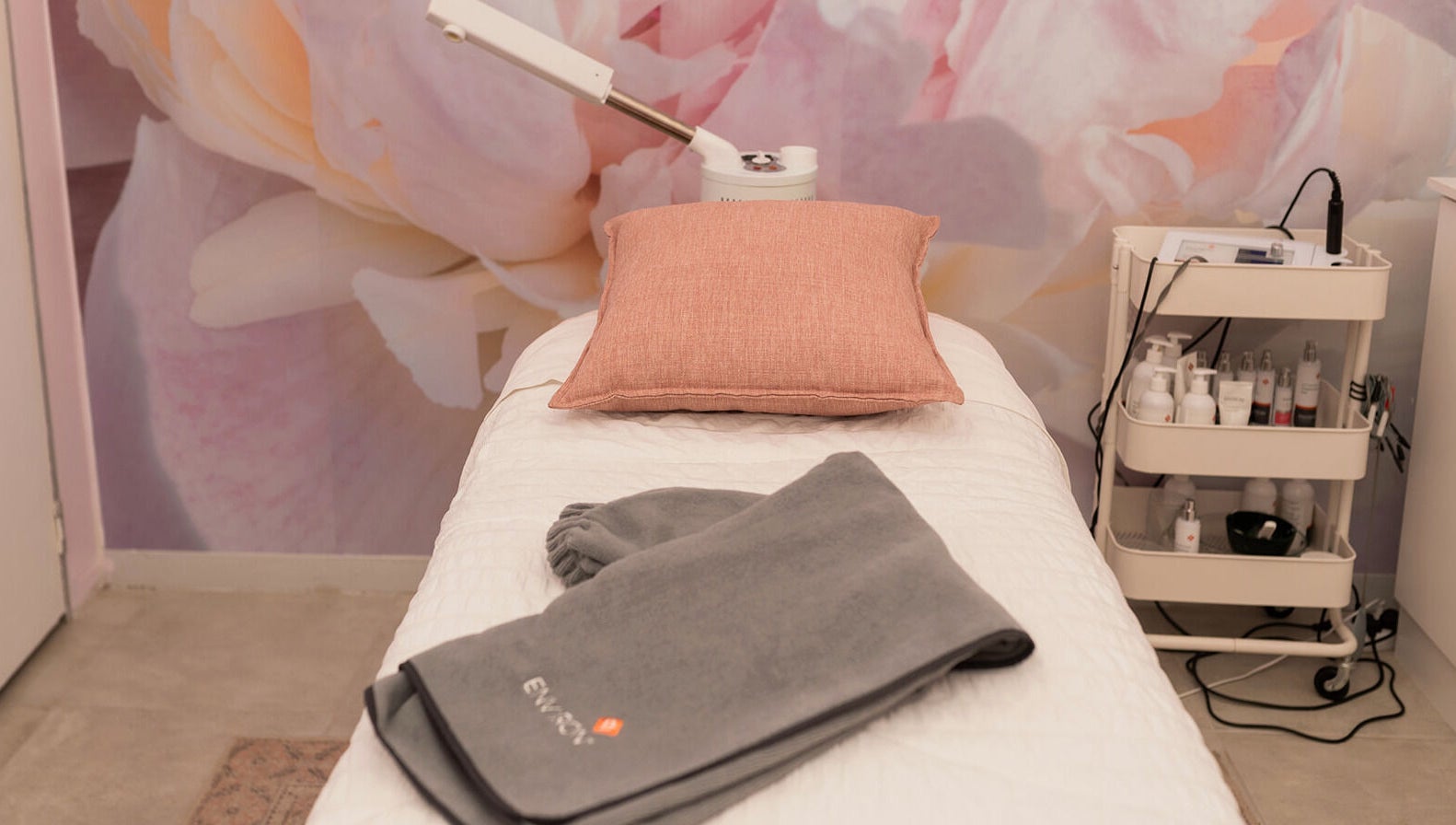 Cozy treatment bed with soft linens at Bloom by Shay in Kloof, Kwazulu-natal, ZA, offering ultimate relaxation.