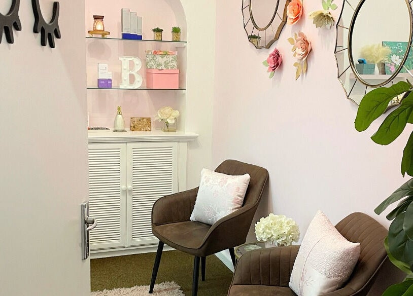 Calm seating area at Bloom by Shay in Kloof, Kwazulu-natal, ZA with decor and comfortable chairs.