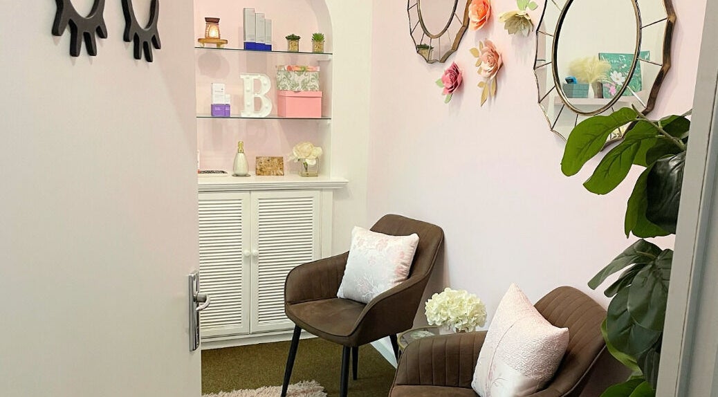 Calm seating area at Bloom by Shay in Kloof, Kwazulu-natal, ZA with decor and comfortable chairs.