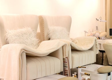 Luxurious spa chairs at Pocobeauty, Singapore, SG, offering comfort and style in a tranquil setting.