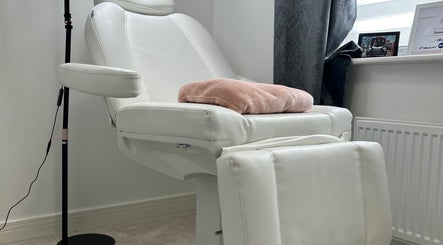 Elegant white treatment chair at TC SKIN CARE BEAUTY, Houghton Regis, England, GB, offering comfort and relaxation.