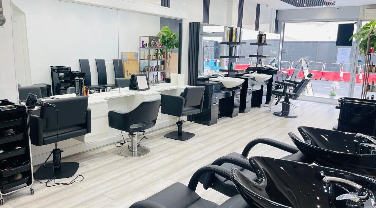 Modern interior of Camden Hair & Beauty Spa in London, England, GB featuring sleek styling stations.