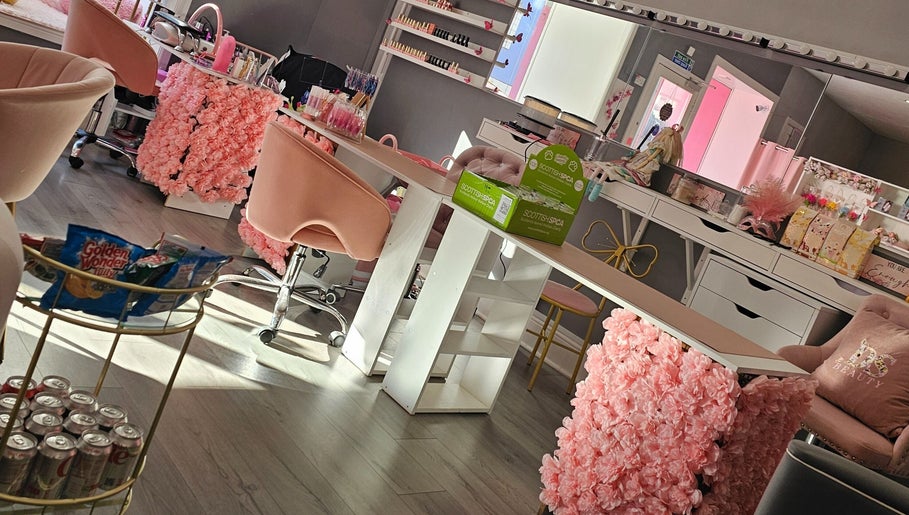 Chic beauty lounge with pink floral decor at Scrunch.N.Curl, Dundee, Scotland, GB.