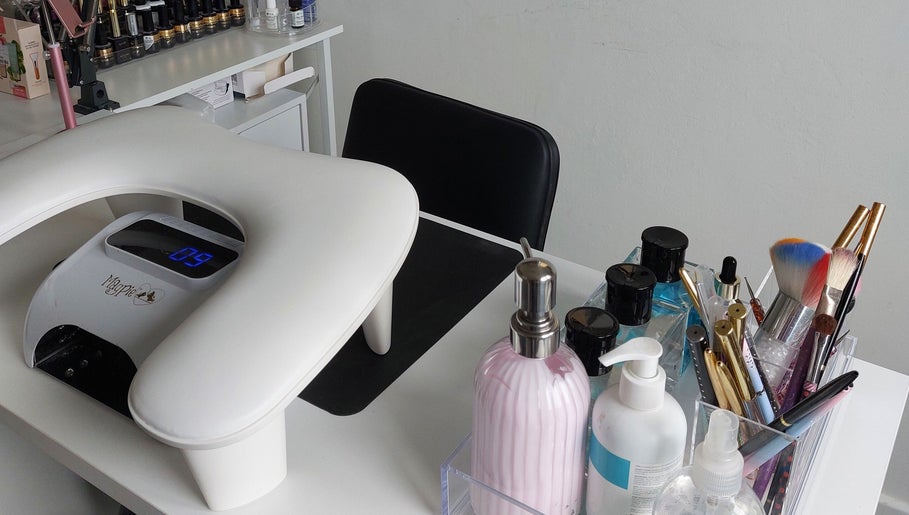 Elegant nail station setup at Sophie Ward Nail Artist, Walmer, England, GB, showcasing tools and products.
