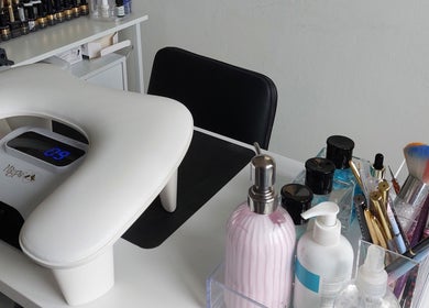 Elegant nail station setup at Sophie Ward Nail Artist, Walmer, England, GB, showcasing tools and products.