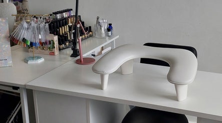 Sophisticated nail workspace at Sophie Ward Nail Artist in Walmer, England, GB, showcasing colorful polish options.
