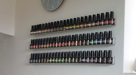 Rows of colorful nail polish bottles at Sophie Ward Nail Artist, Walmer, England, GB.