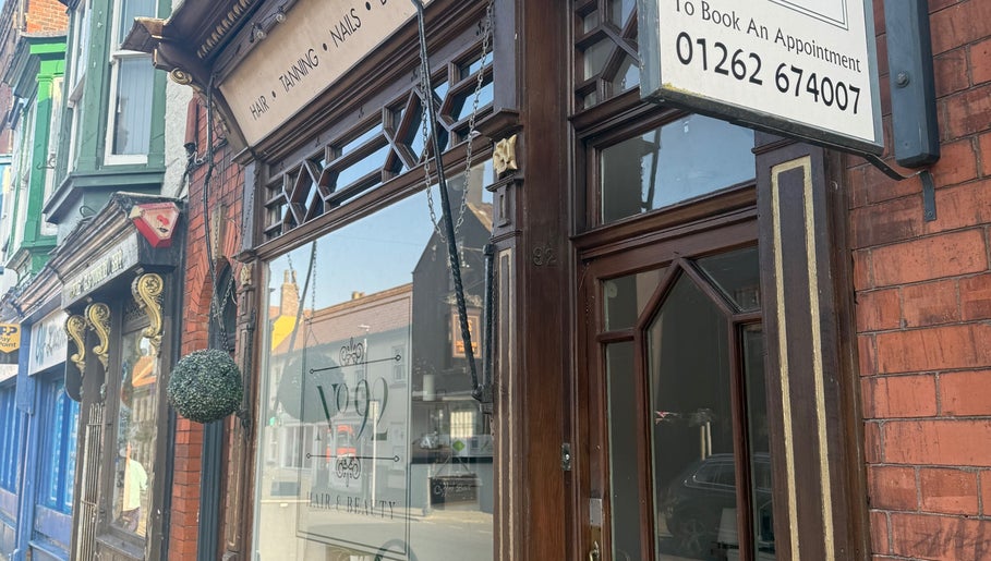Entrance of Kelly at No92 Hair and Beauty in Bridlington, England, GB with vintage decor.