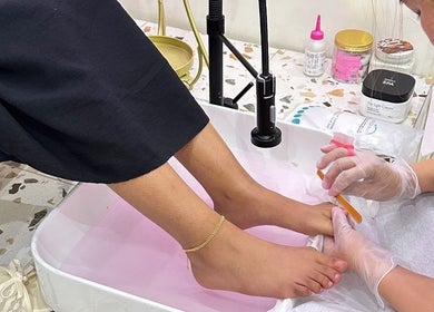 Relaxing pedicure at Purple Nail Spa in Riyadh, Riyadh Province, SA, showcasing professional foot care.