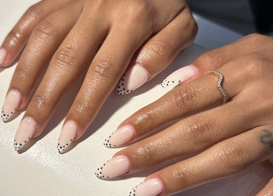 Stylish polka-dot nail art at Purple Nail Spa, Riyadh, Riyadh Province, SA. Perfect for a chic look.