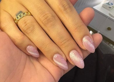 Close-up of glittery pink nails from Purple Nail Spa, Riyadh, Riyadh Province, SA.
