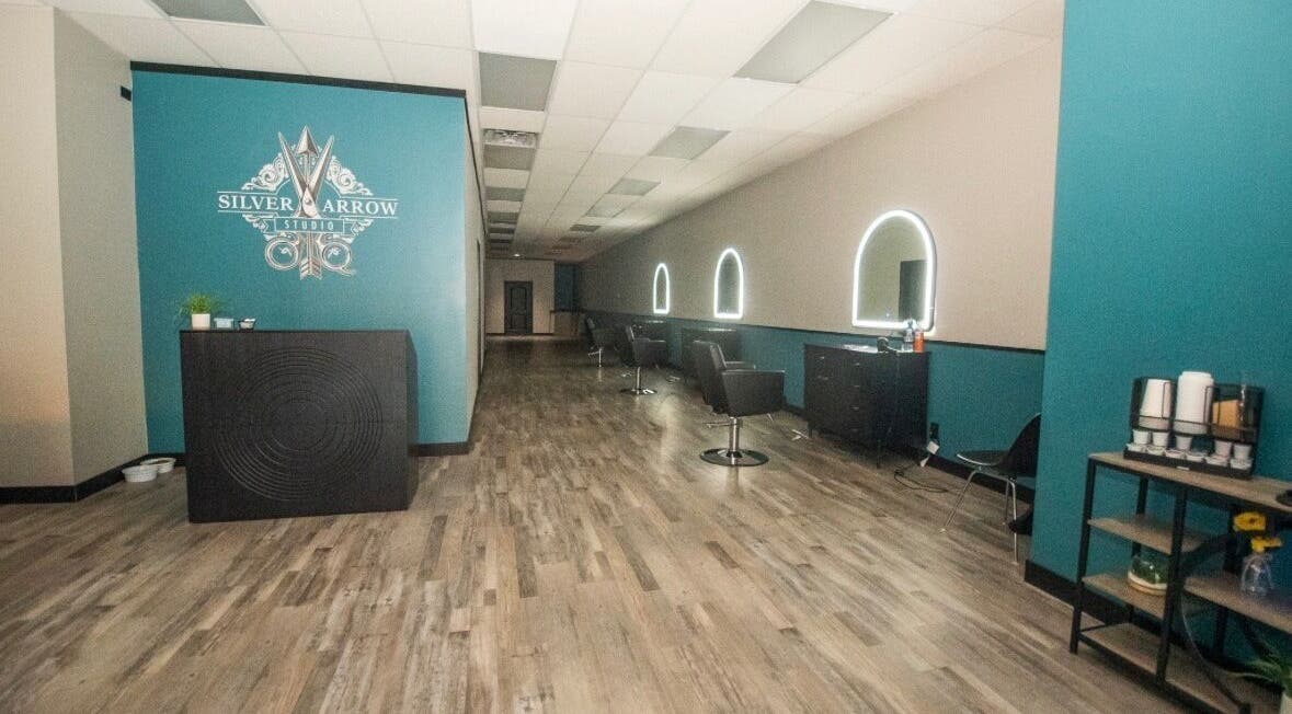 Interior view of Tasha Foster - Silver Arrow Studio in Dixon, Illinois, US with modern salon stations.