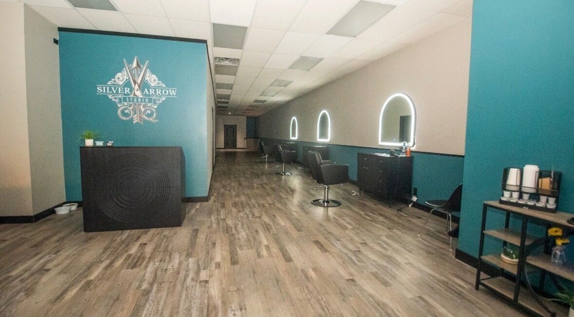 Interior view of Tasha Foster - Silver Arrow Studio in Dixon, Illinois, US with modern salon stations.