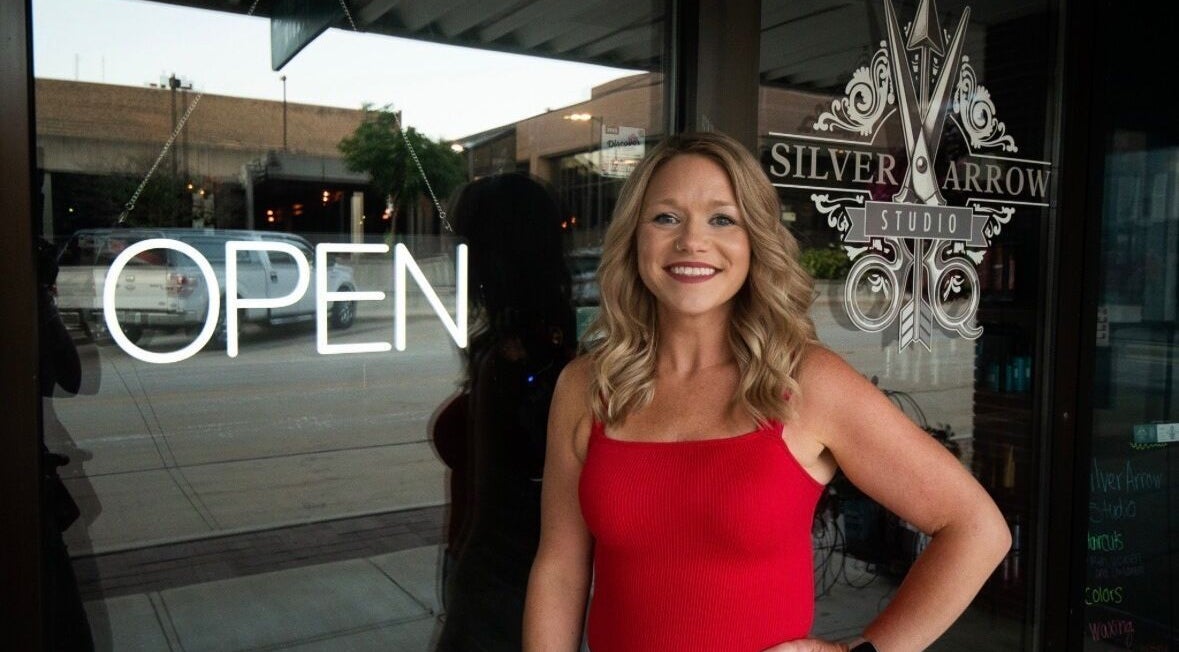 Tasha Foster welcomes you to Silver Arrow Studio in Dixon, Illinois, US, with an inviting open sign.