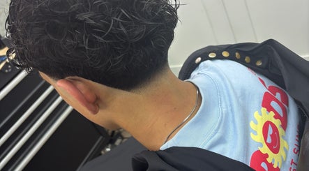 Muba Cuts Hair