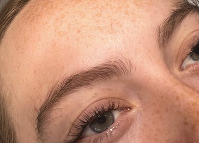 Close-up of perfectly shaped eyebrows and lashes at No4Beauty in Sandy, England, GB.