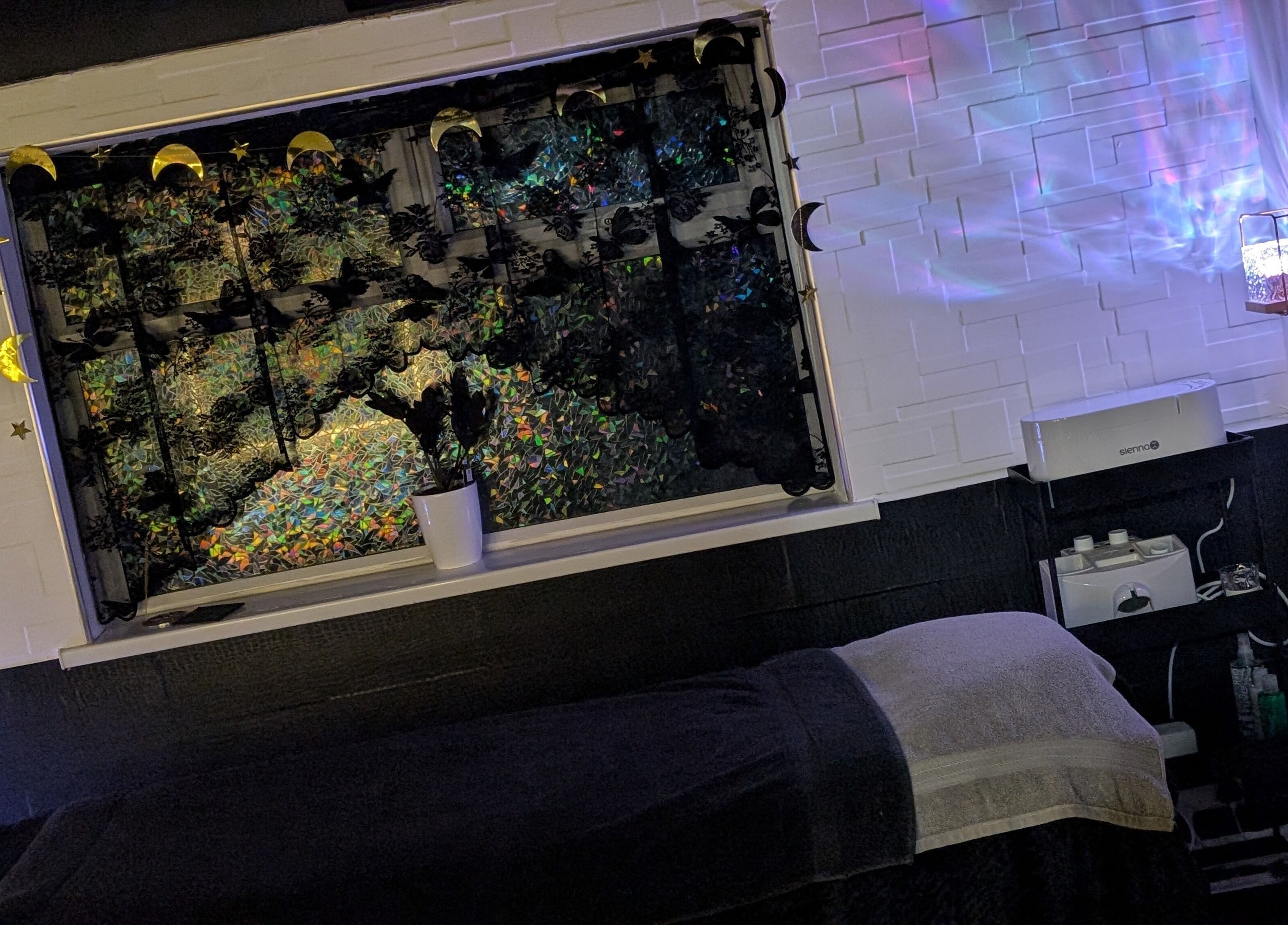 Relaxing treatment room at Beauty at the Beestons, Newcastle-under-Lyme, England, GB with soothing decor.