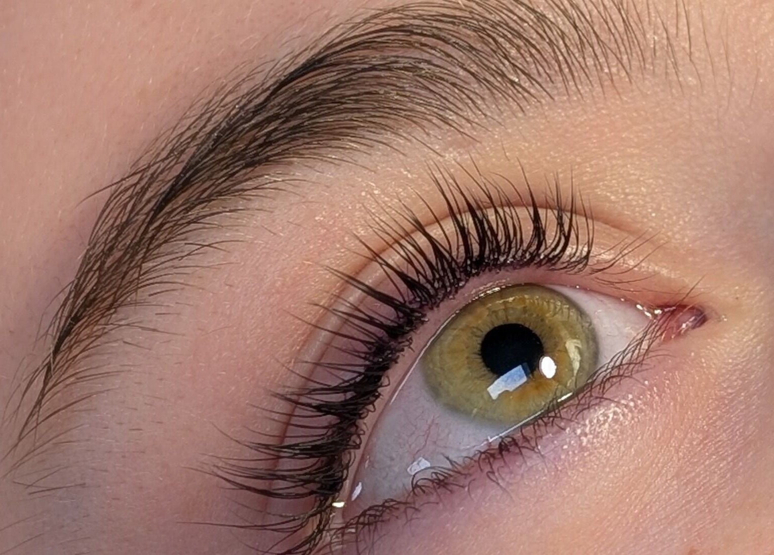 Detailed close-up of well-groomed eyebrow and lush eyelashes at Beauty at the Beestons, Newcastle-under-lyme, England, GB.