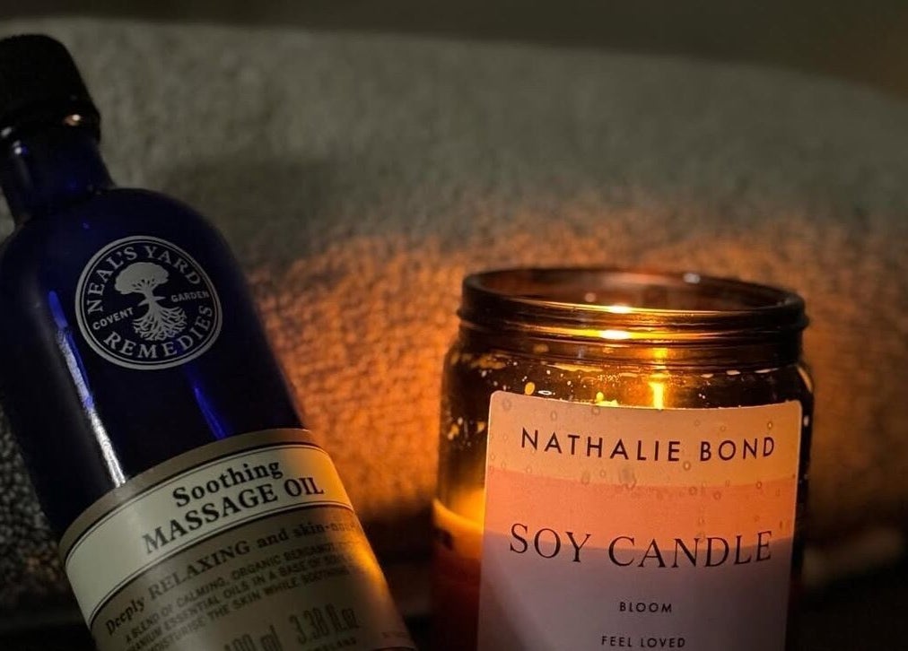 Relaxing massage oil and candle ambiance at The Laser Room Ramsbottom, Bury, England, GB.