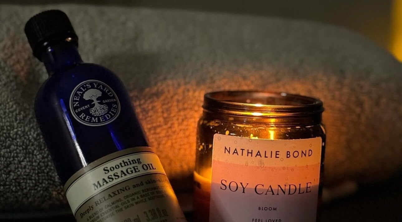 Relaxing massage oil and candle ambiance at The Laser Room Ramsbottom, Bury, England, GB.