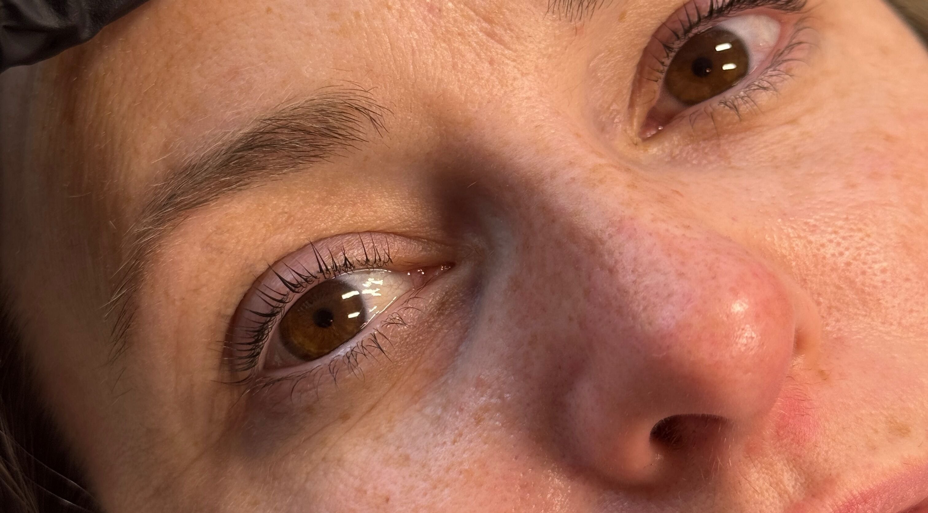 Close-up of enhanced eyelashes at The Lash Box, Bristol, England, GB, showcasing beauty treatment.