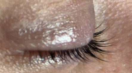 Close-up of exquisite eyelash extension at Delilah May Beauty, England, GB, showcasing natural elegance.