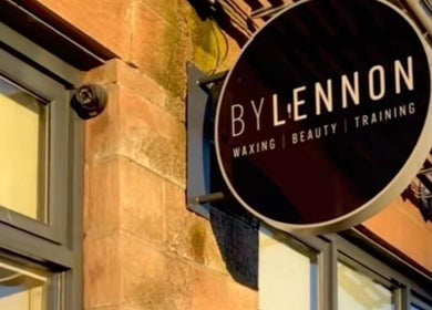 Uplift Beauty signage against rustic brick facade in Edinburgh, Scotland, GB.