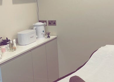 Calm beauty treatment room at Uplift Beauty, Edinburgh, Scotland, GB, showcasing skincare essentials.