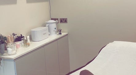 Calm beauty treatment room at Uplift Beauty, Edinburgh, Scotland, GB, showcasing skincare essentials.