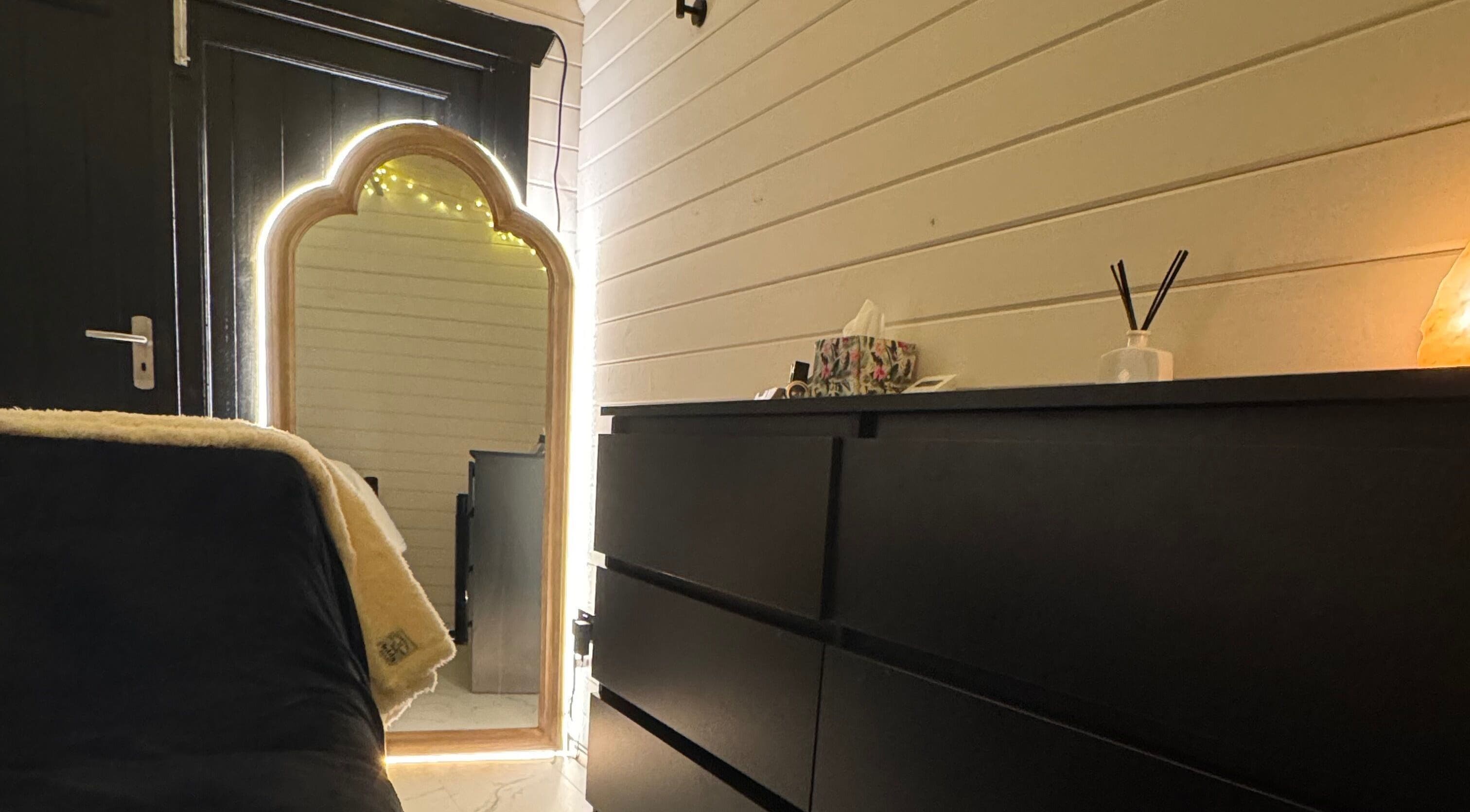 Tranquil space at Natural Beauty By Natalie, Little Dunmow, England, with elegant mirror and ambience.