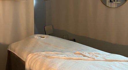 Massage table at Libertys Wellness Retreat, Melton Mowbray, England for relaxation and therapy.
