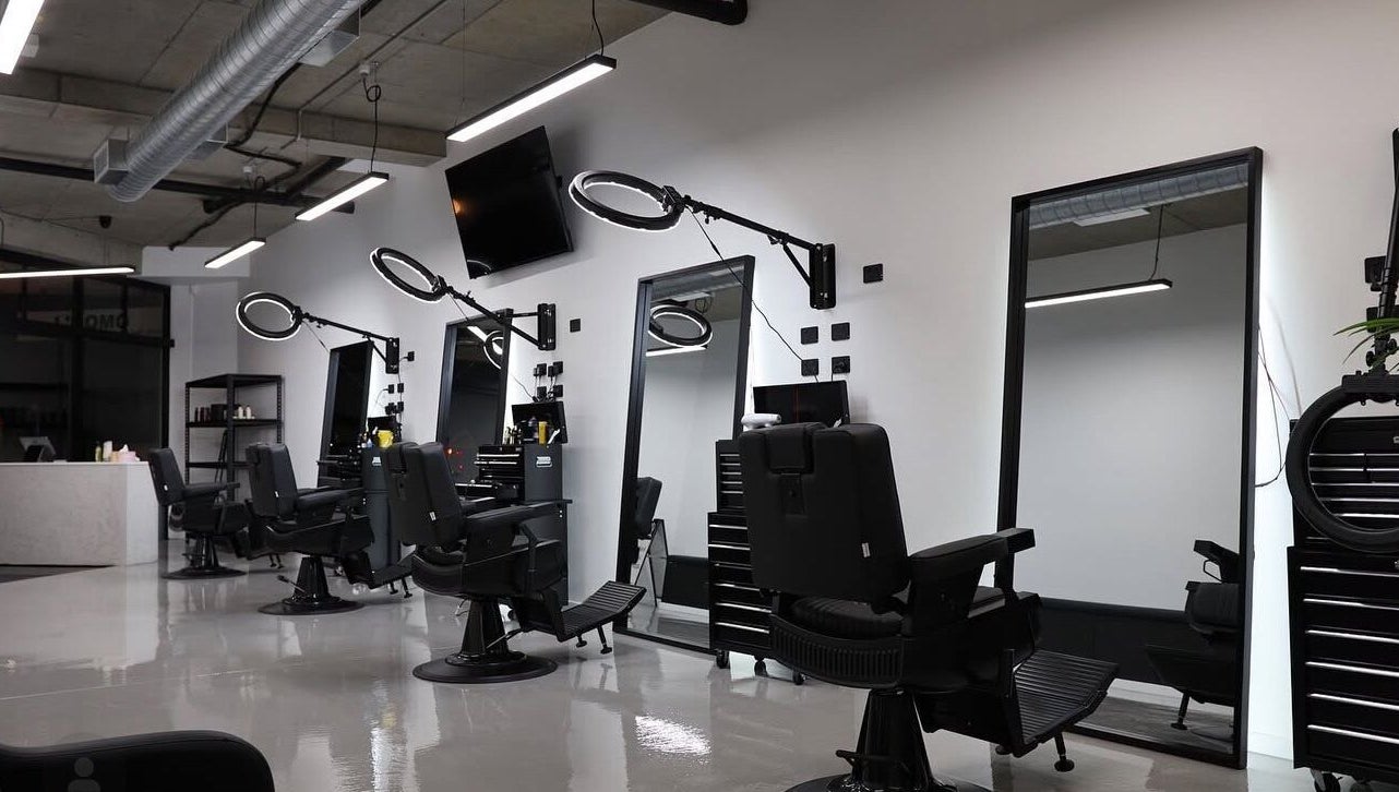 Modern barber chairs and mirrors at Elevate Barber Studio in Stanmore, New South Wales, AU.