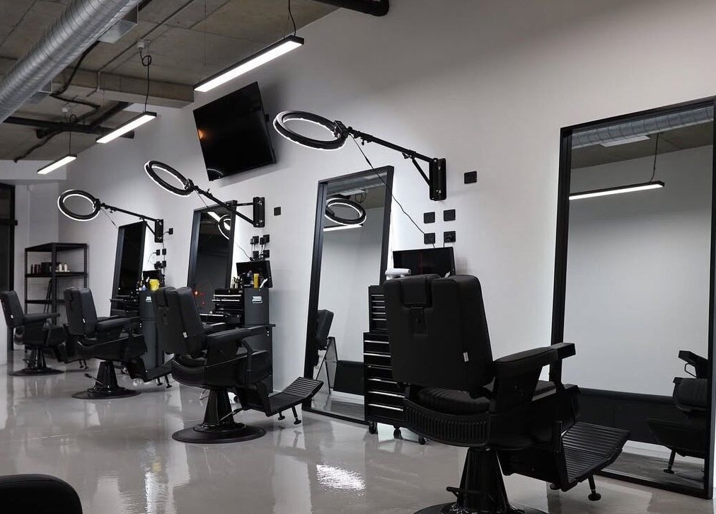 Modern barber chairs and mirrors at Elevate Barber Studio in Stanmore, New South Wales, AU.