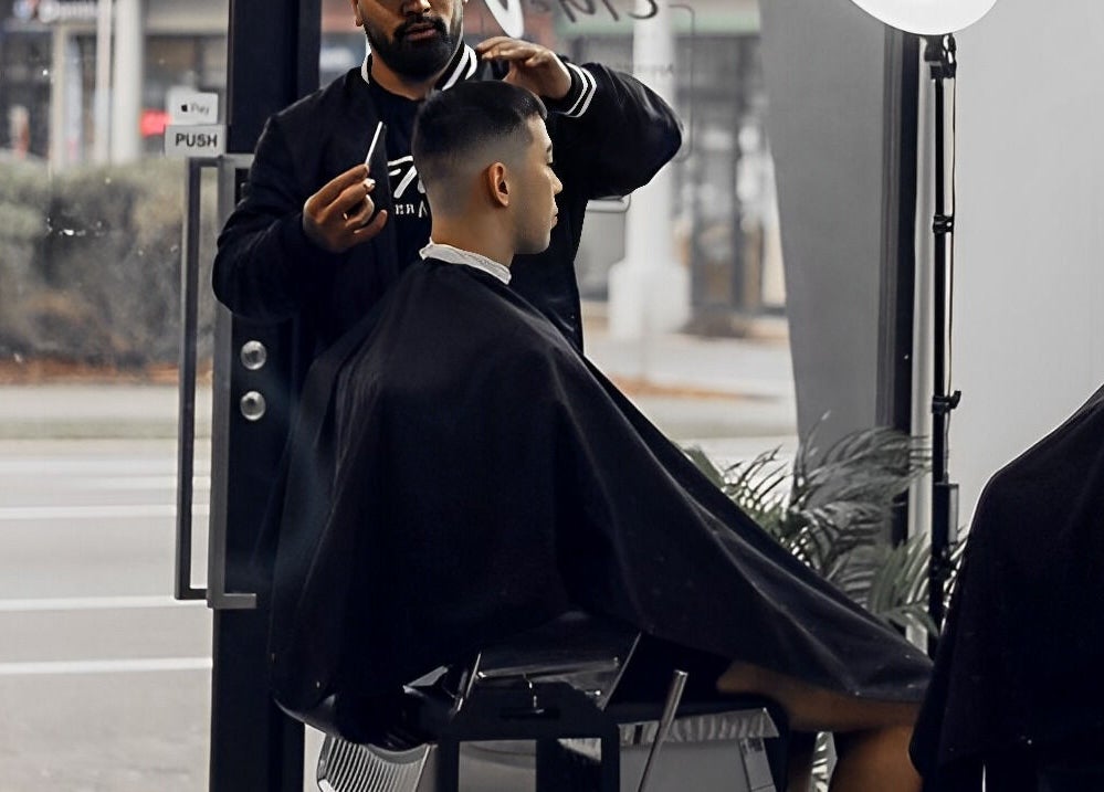 Haircut at Elevate Barber Studio in Stanmore, New South Wales, AU. Modern interior with skilled barber.