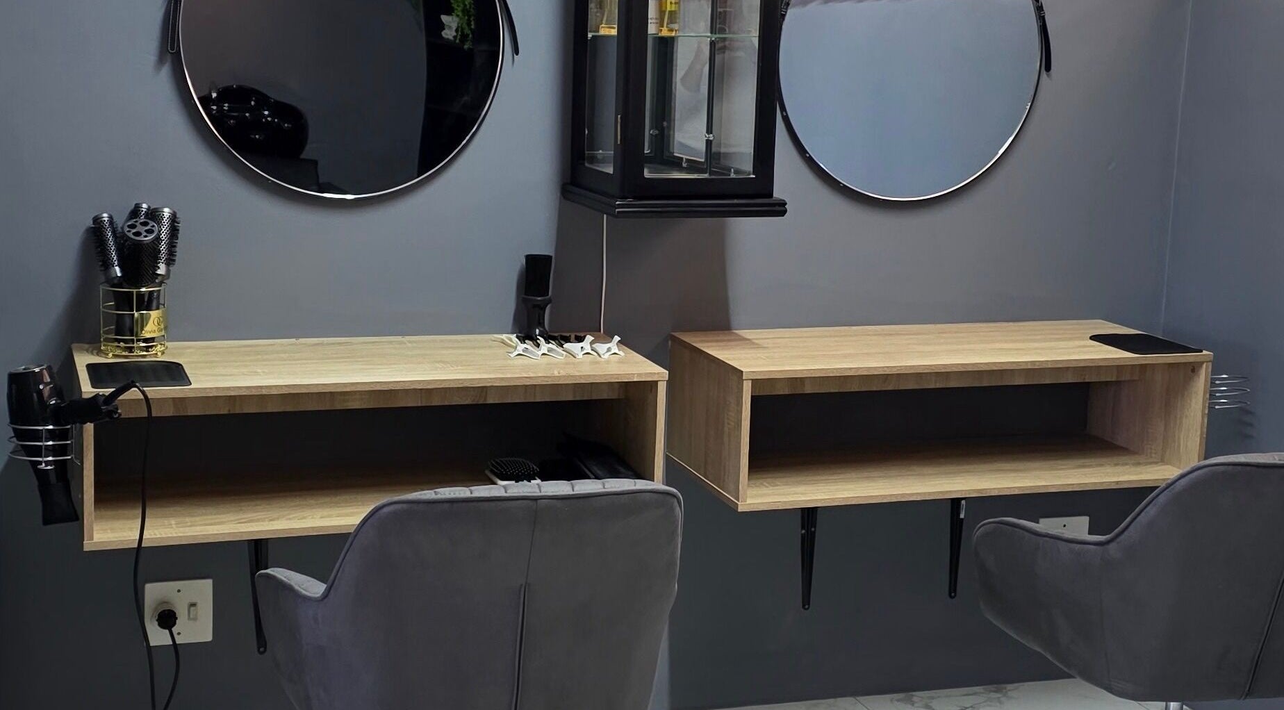 Chic styling station at M's Aesthetics, Krugersdorp, Gauteng, ZA with modern mirrors and grooming tools.