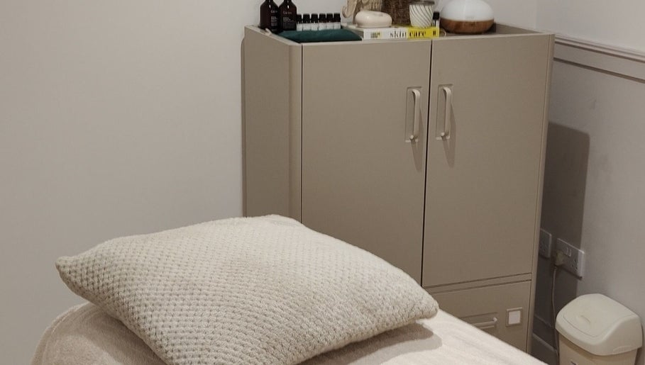 Tranquil treatment room with soft lighting at Serenity & Wellness Therapies, Par, England, GB.