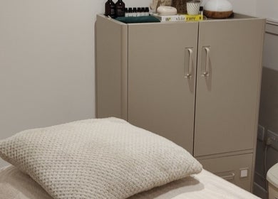 Tranquil treatment room with soft lighting at Serenity & Wellness Therapies, Par, England, GB.