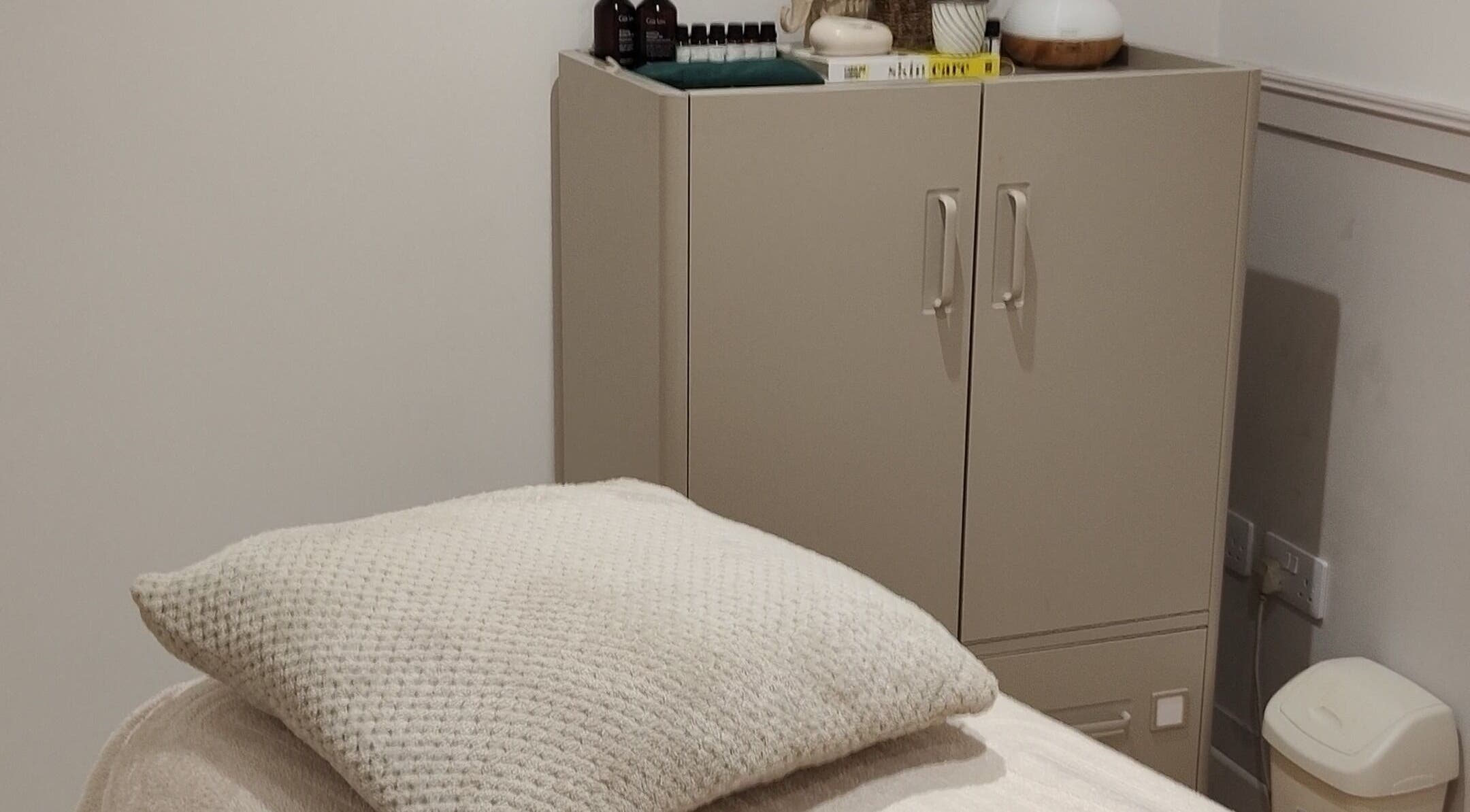 Tranquil treatment room with soft lighting at Serenity & Wellness Therapies, Par, England, GB.