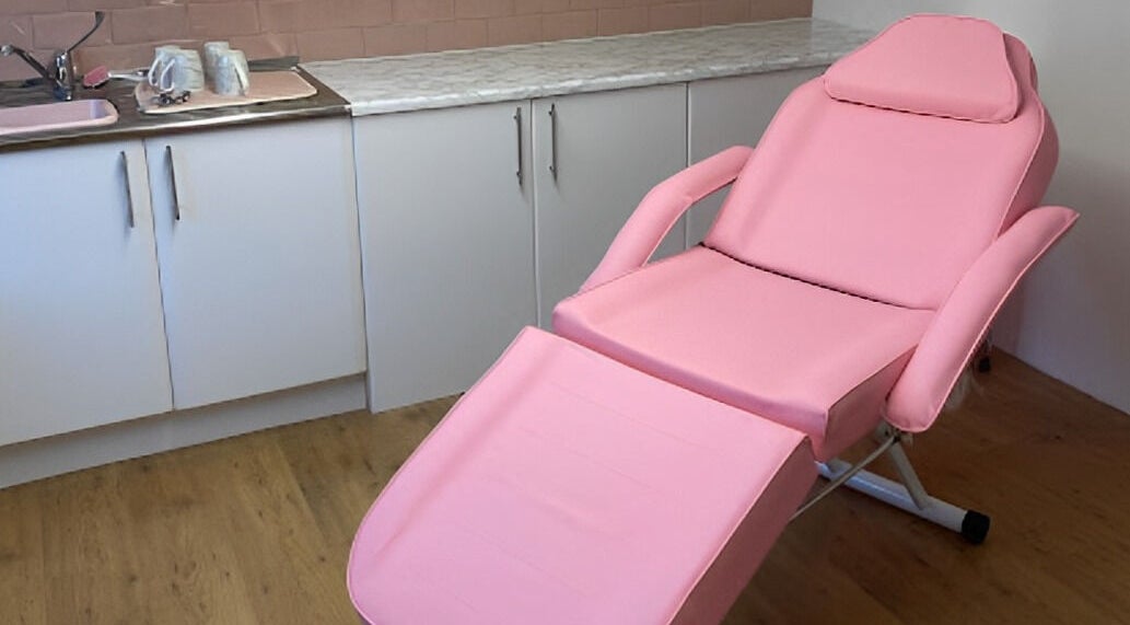 Pink beauty chair at Alex Lajbrok Makeup, Middlesbrough, England, GB, ready for client treatments.