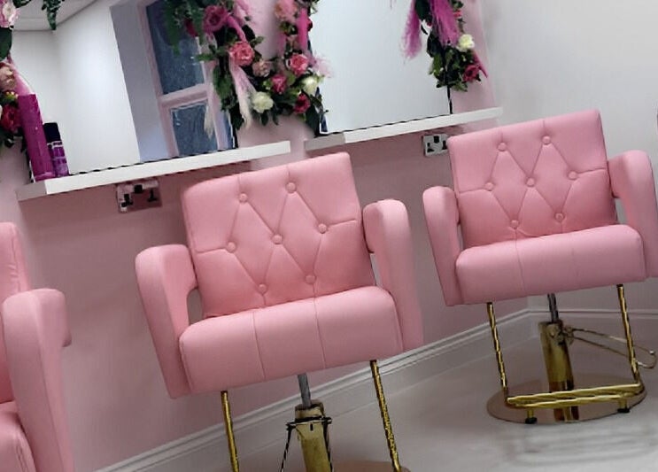 Stylish pink chairs in Alex Lajbrok Makeup studio, Middlesbrough, England, GB enhancing its chic ambiance.