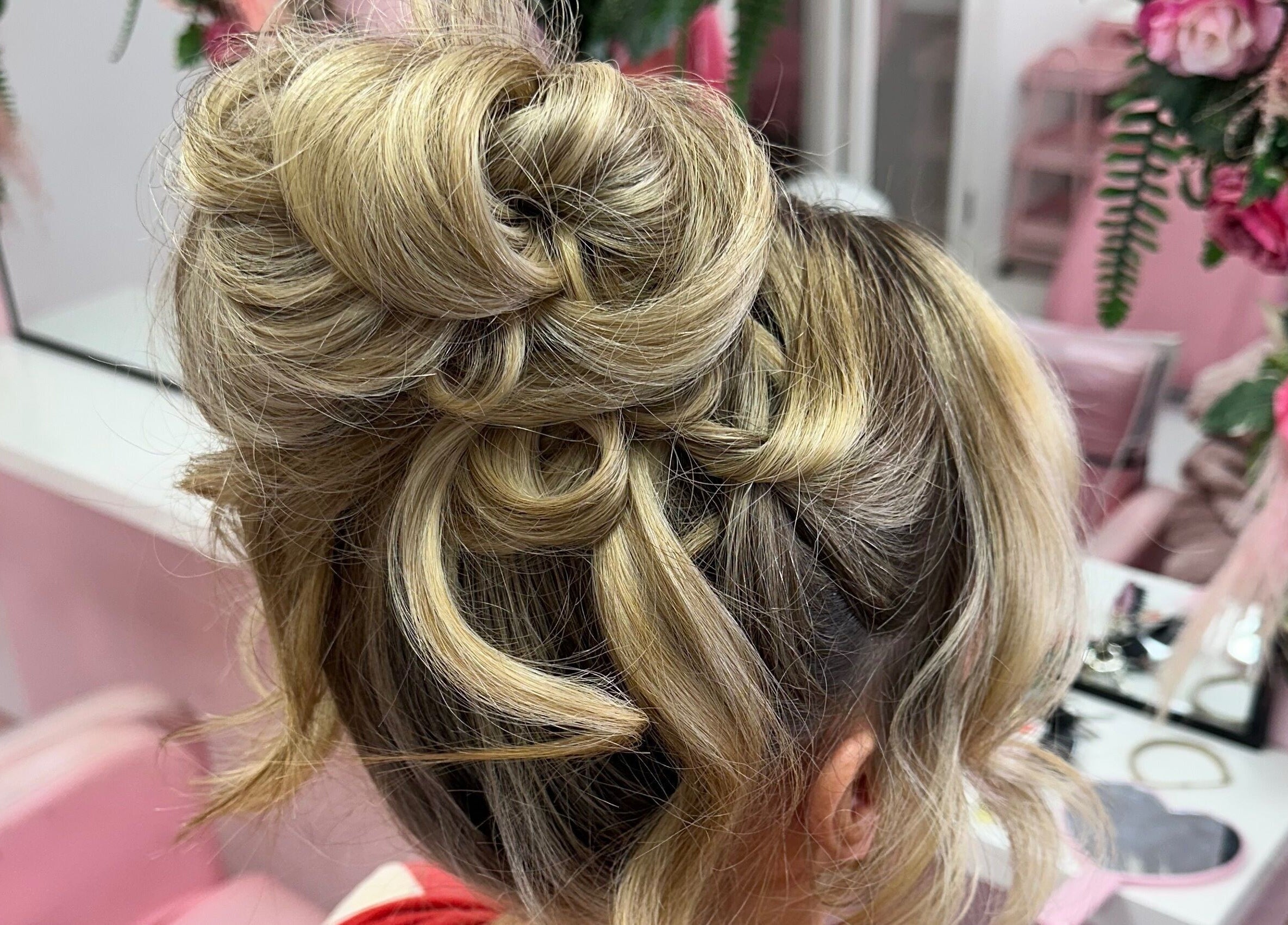 Elegant updo hairstyle at Alex Lajbrok Makeup in Middlesbrough, England, GB showcasing intricate details.