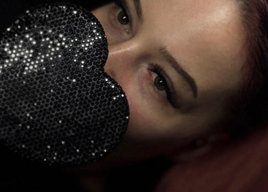 Close-up of a woman's eyes with sparkly heart at Ar Lash Artistry, Yarrabilba, Queensland, AU.