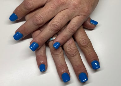 Bright blue nail polish design at Nails By Corrina in Lethbridge Park, New South Wales, AU.