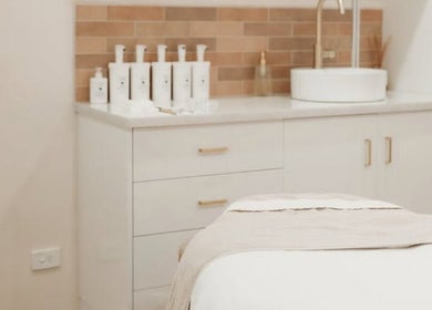 Calming treatment room at Fleek Aesthetics, Mount Pleasant, Queensland, AU with elegant design and soothing tones.