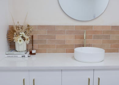 Elegant washbasin with floral decor at Fleek Aesthetics, Mount Pleasant, Queensland, AU.